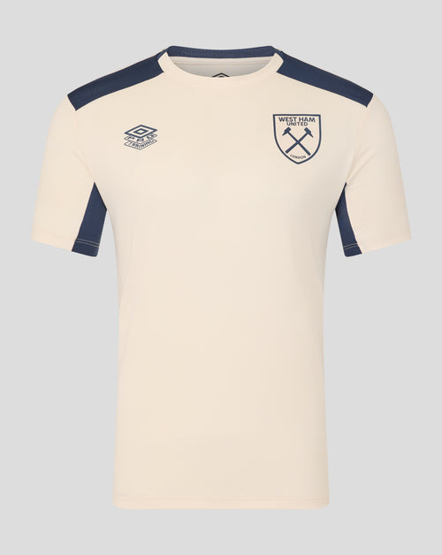 Cream training shirt with navy shoulder panels and West Ham crest on the chest