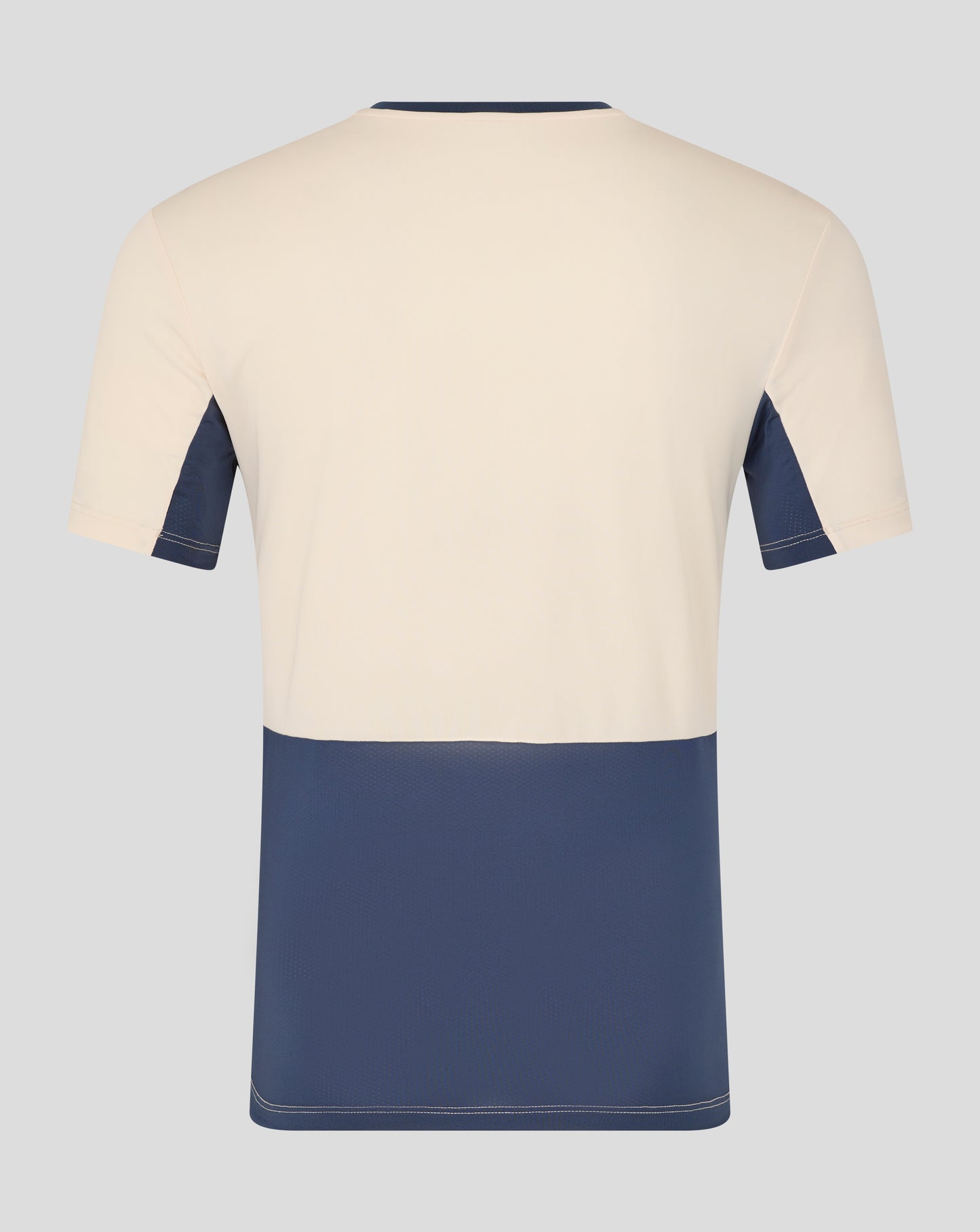 Back view of cream West Ham Pro Training Short Sleeve Shirt with navy panels and contrasting hem
