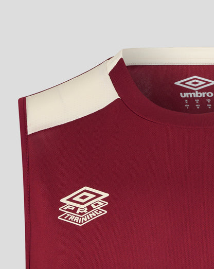Front close-up of burgundy West Ham training shirt showing the Umbro logo and training emblem