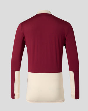 Back view of burgundy West Ham training midlayer with cream collar and shoulder panels.