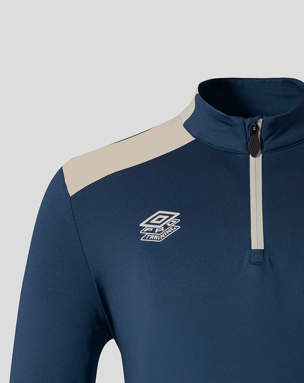 Navy West Ham Pro Training midlayer top with cream shoulder panel and front zipper and chest logo.