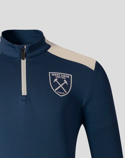 Navy West Ham Pro Training midlayer top with beige shoulder panel and club crest on the chest.