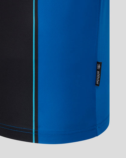 Close-up of AFC Bournemouth home shirt fabric in blue with black panel and turquoise piping.