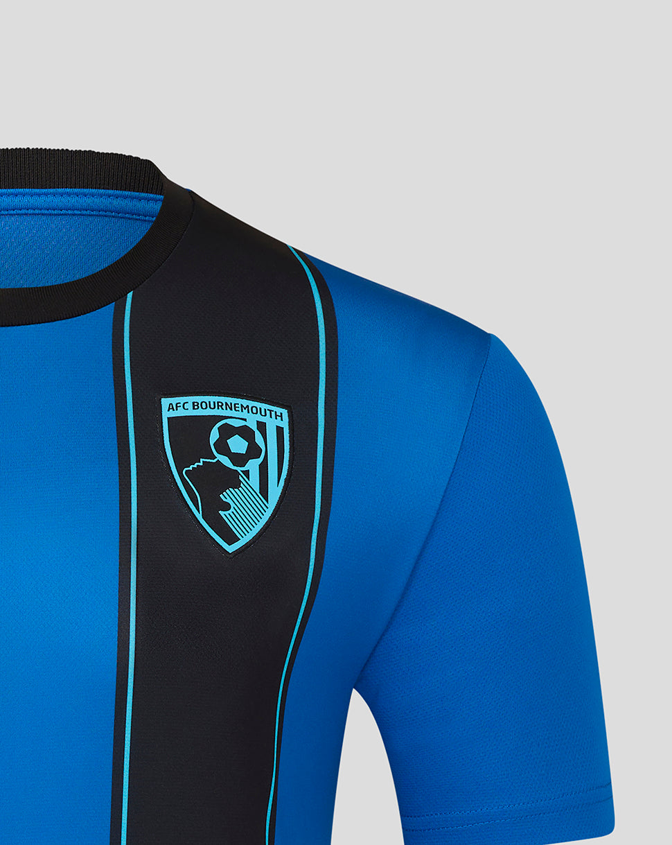Close up of chest on blue AFC Bournemouth home shirt featuring a black vertical stripe with turquoise trim and the club crest