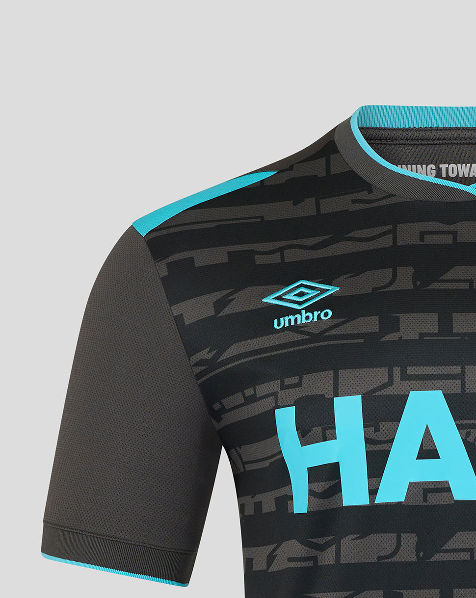 Ipswich Town third kit shirt shoulder close up with turquoise trim and teal Umbro logo on black camo pattern