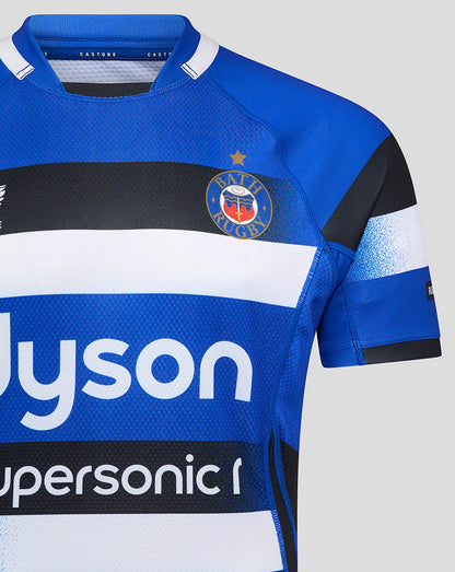 Close up of Bath Rugby Home Pro Shirt showing Bath crest and bold stripe design