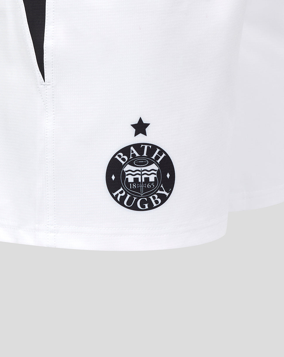 Close up of white shorts showing Bath Rugby crest near the hem with a star above.