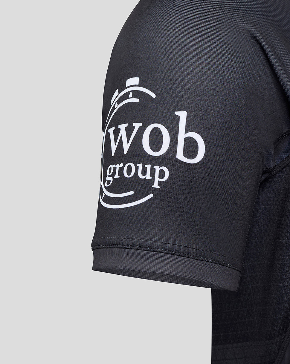 Sleeve of Bath Rugby Pro Shirt in dark navy with a white sponsor logo.