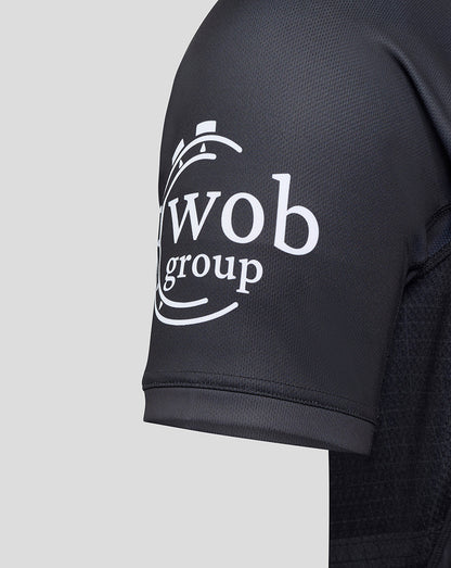 Sleeve of Bath Rugby Pro Shirt in dark navy with a white sponsor logo.