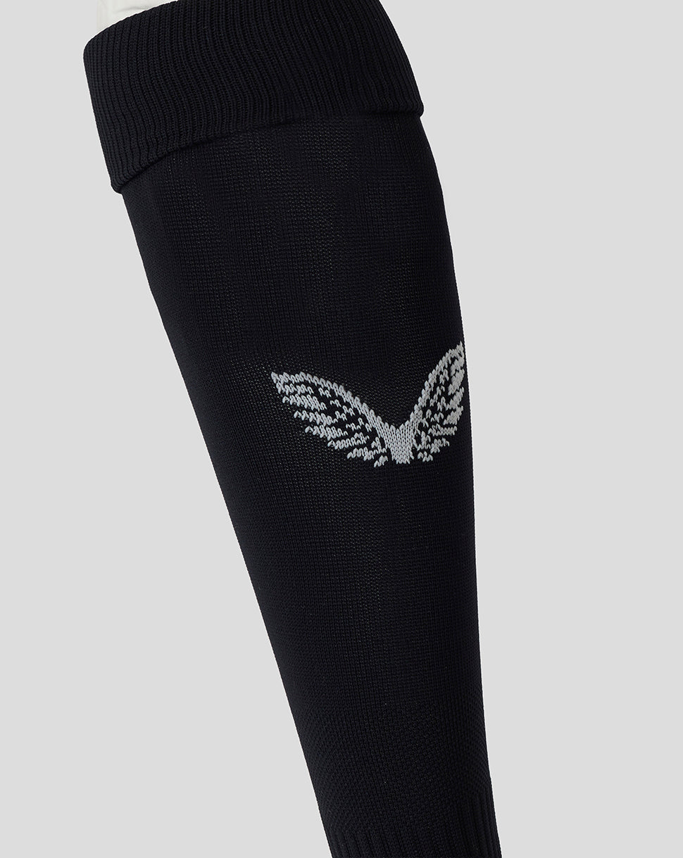 Close-up of a Bath Rugby black sock with a white wing logo on the calf