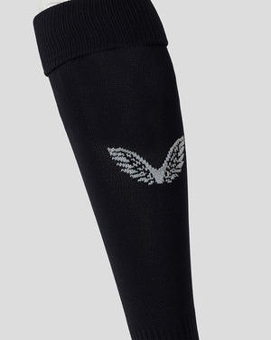 Close-up of a Bath Rugby black sock with a white wing logo on the calf
