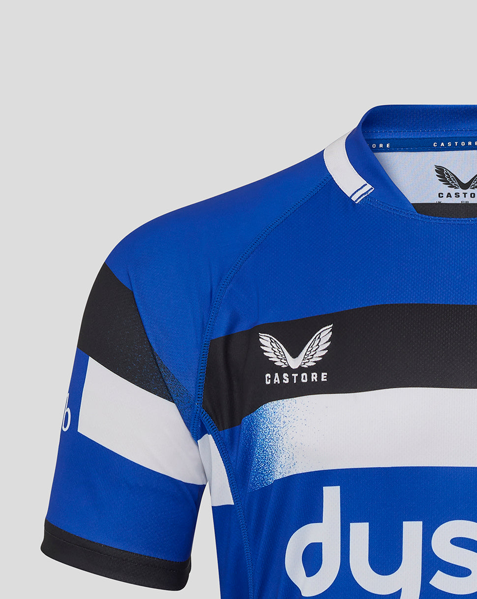 Bath Rugby Home Replica Shirt close up showing blue fabric with a black chest stripe and white collar trim.