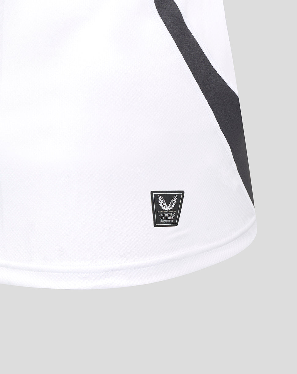 Close up of the white Bath Rugby jersey hem showing the Castore product badge.