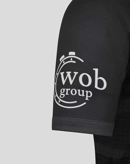 Sleeve of Bath Rugby shirt with wob group logo in white on black fabric