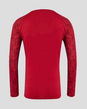 Back view of red Saracens training long sleeve tee with patterned sleeves.