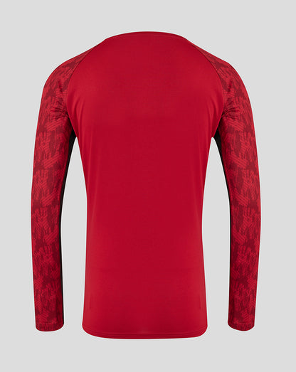 Back view of red Saracens training long sleeve tee with patterned sleeves.