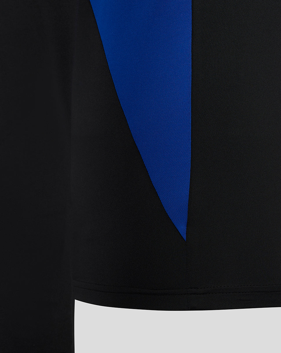 Close-up of Bath Rugby midlayer showing blue diagonal side panel on black fabric