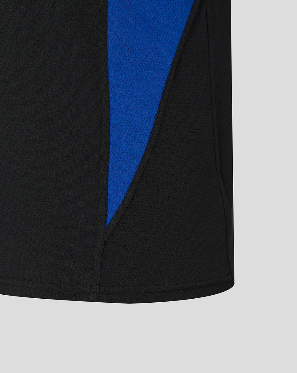 Black sleeveless tee with a vivid blue side panel and curved hem.