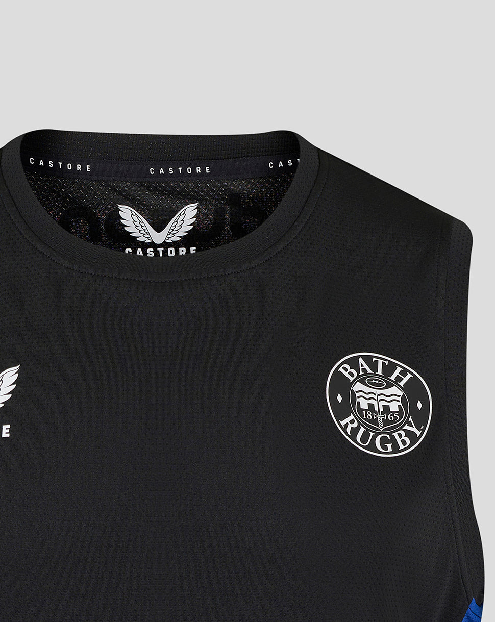 Close up of black Bath Rugby sleeveless tee with Castore label at the neck and a partial Bath Rugby crest on the chest.