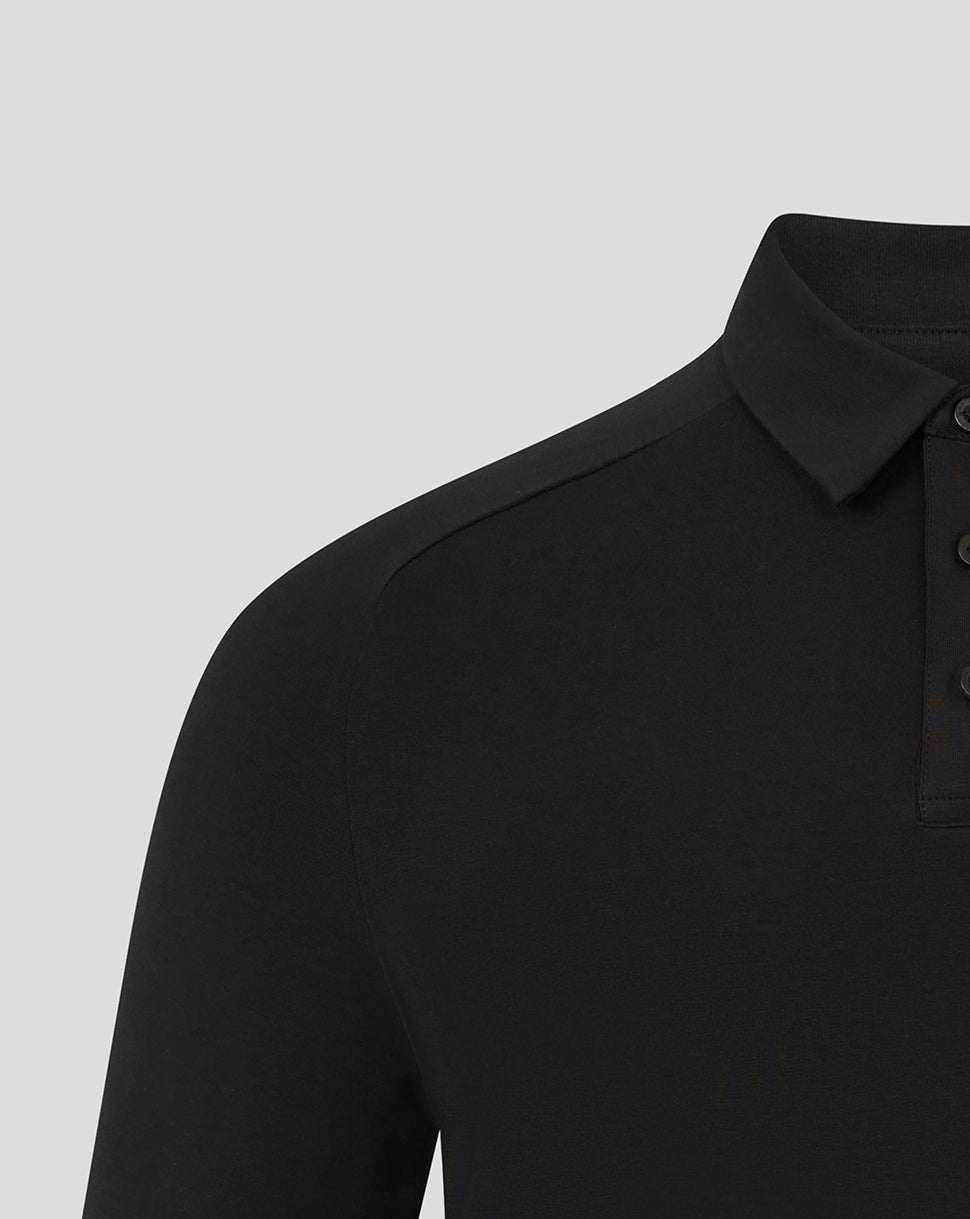 Close-up of the collar and shoulder of the black Bath Rugby polo with button placket