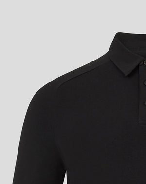 Close-up of the collar and shoulder of the black Bath Rugby polo with button placket