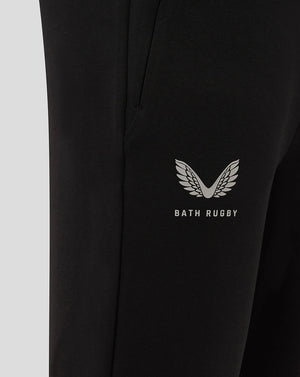 Close-up of the Bath Rugby wing logo and Bath Rugby text on a black Travel Knit Pant leg