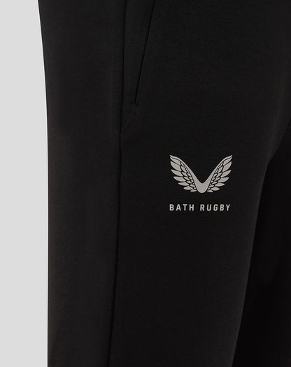 Close-up of the Bath Rugby wing logo and Bath Rugby text on a black Travel Knit Pant leg