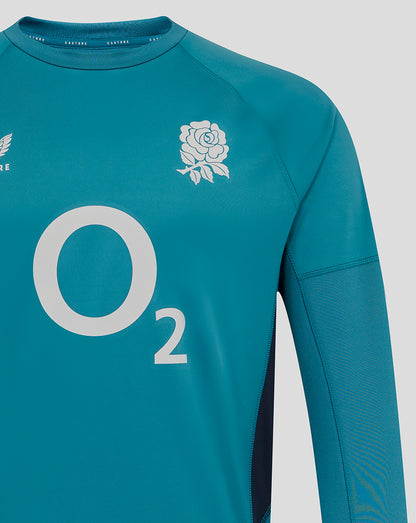 Close up of Storm Blue drill top chest featuring rose crest and O2 branding