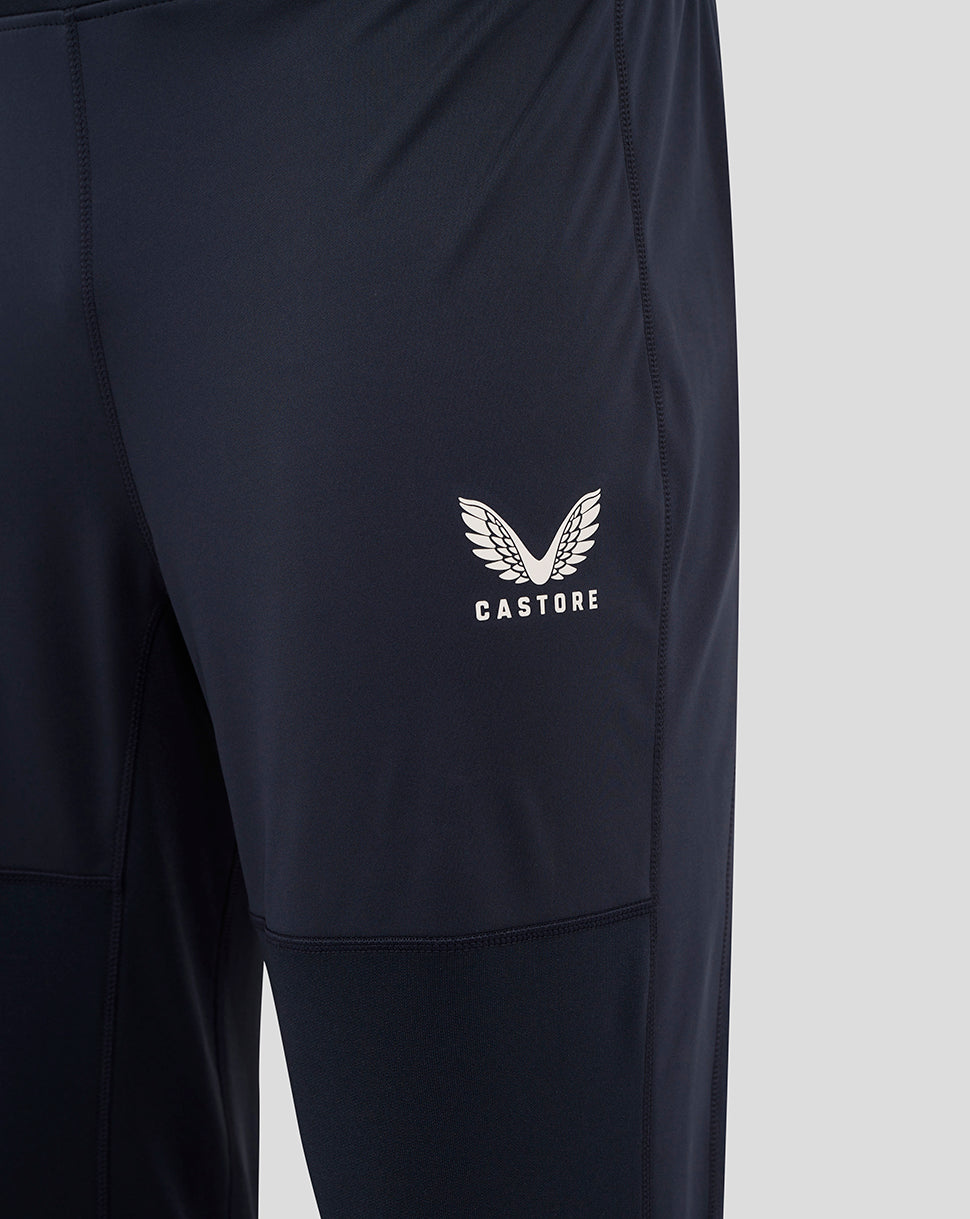 Navy England Rugby drill pants leg with panel seams and Castore logo on the left thigh