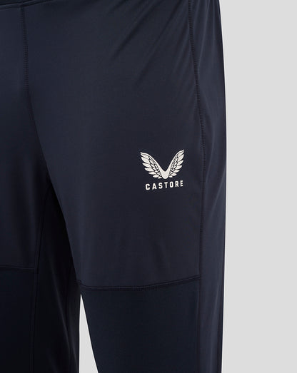 Navy England Rugby drill pants leg with panel seams and Castore logo on the left thigh