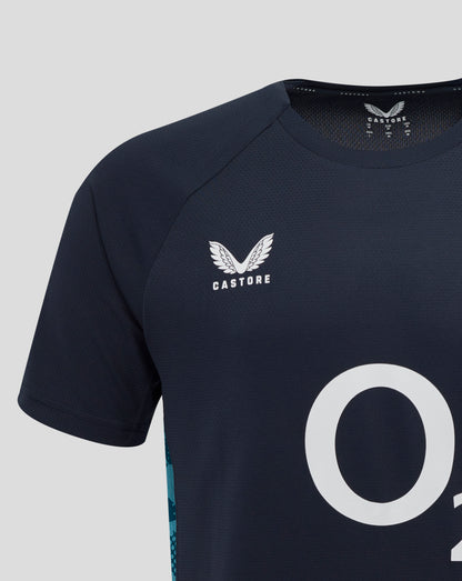 Close-up of navy England Rugby performance T-shirt fabric with a white rose crest on the chest and Castore branding at the neckline