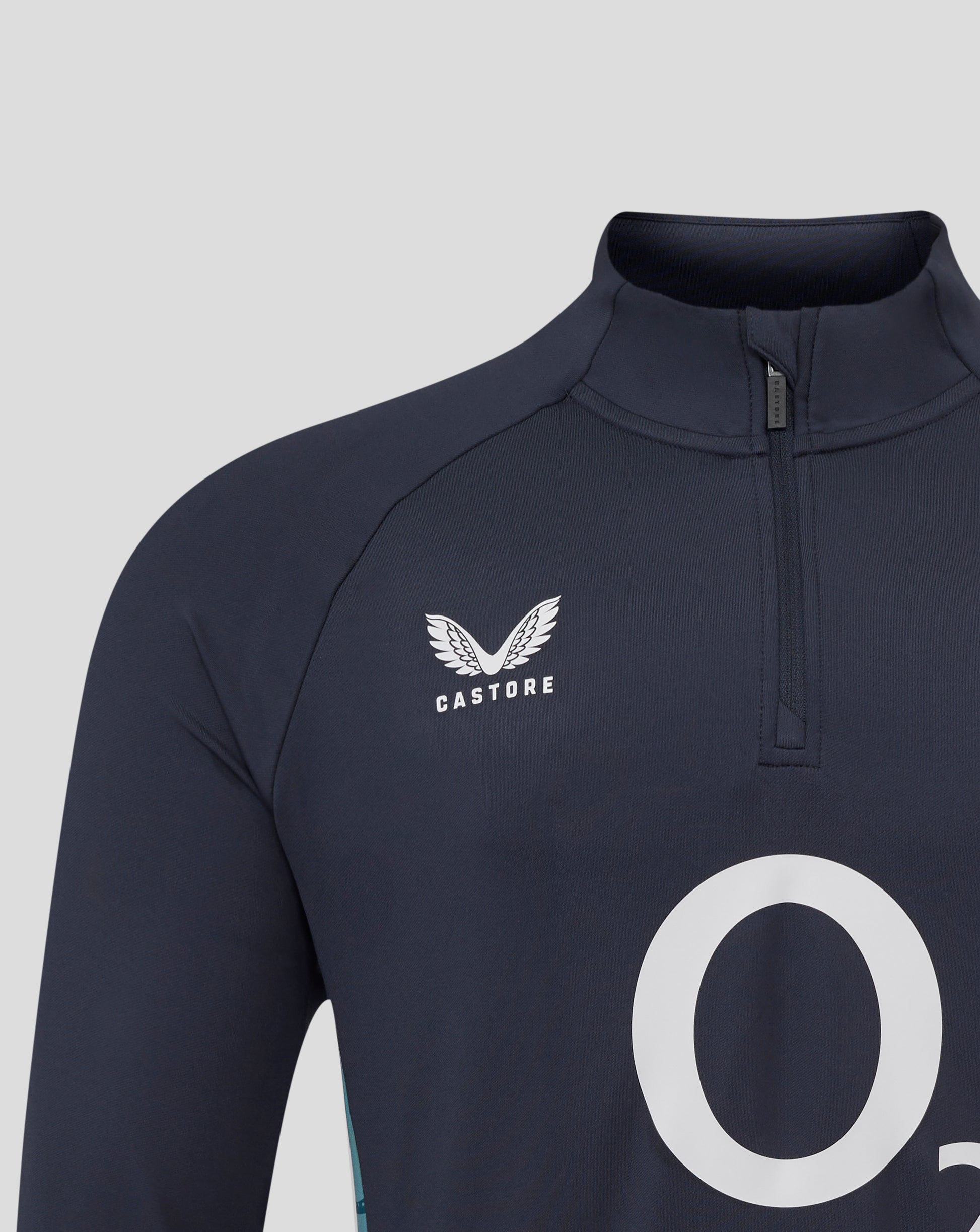 Close-up of navy England rugby midlayer collar with funnel neckline and quarter zip
