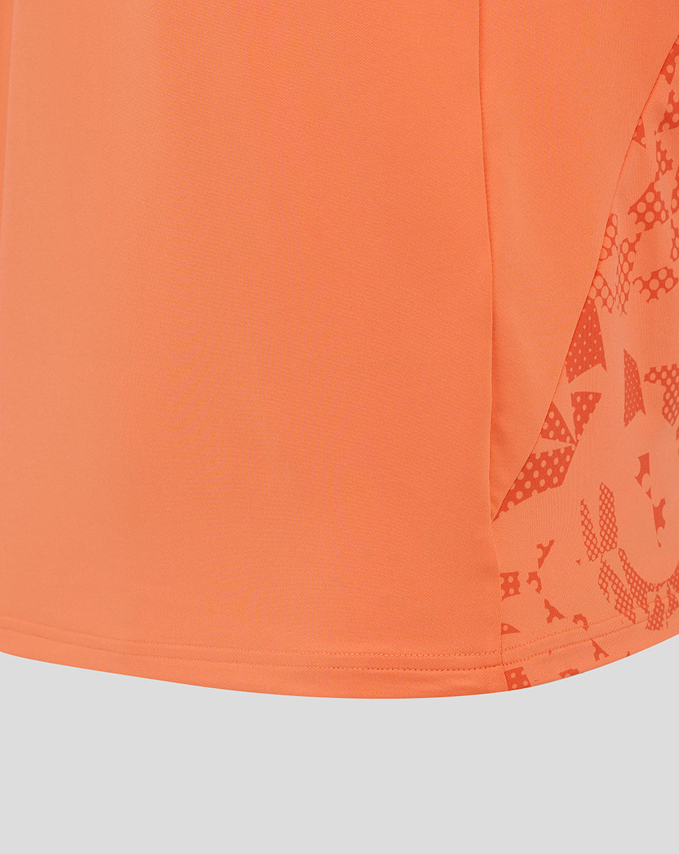 Melon colored England Rugby long sleeve midlayer top with printed side panels and curved hem