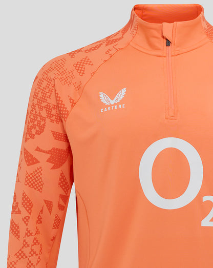 Chest detail of melon long sleeve midlayer featuring large O2 graphic and Castore branding.