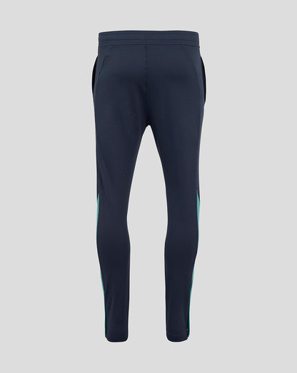 Back view of navy England Rugby knit pants with elastic waistband and teal side panels.
