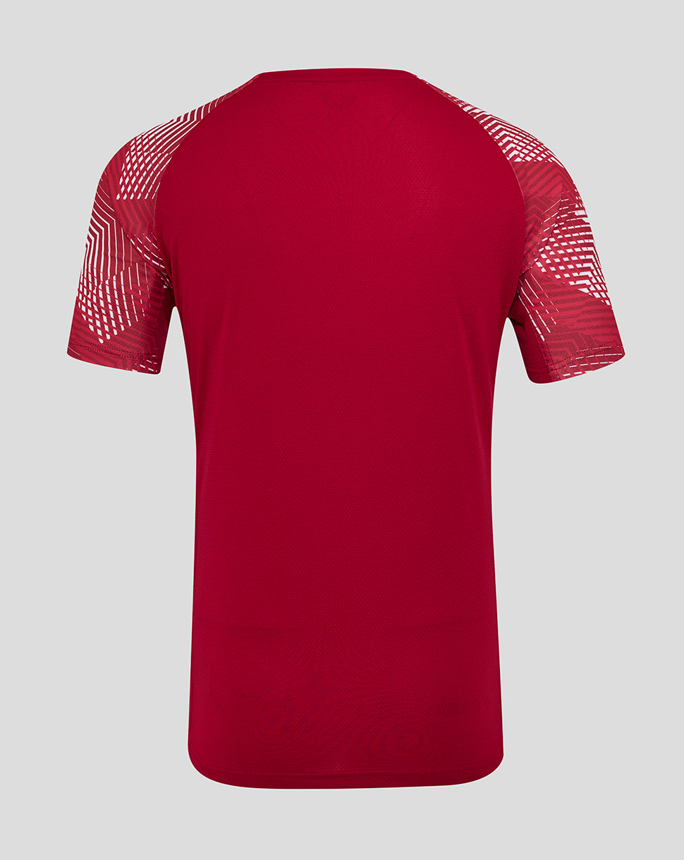 Back view of bold red England Rugby pre match short sleeve T shirt with geometric sleeve print and dropped back hem