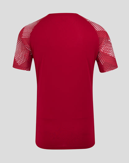 Back view of bold red England Rugby pre match short sleeve T shirt with geometric sleeve print and dropped back hem