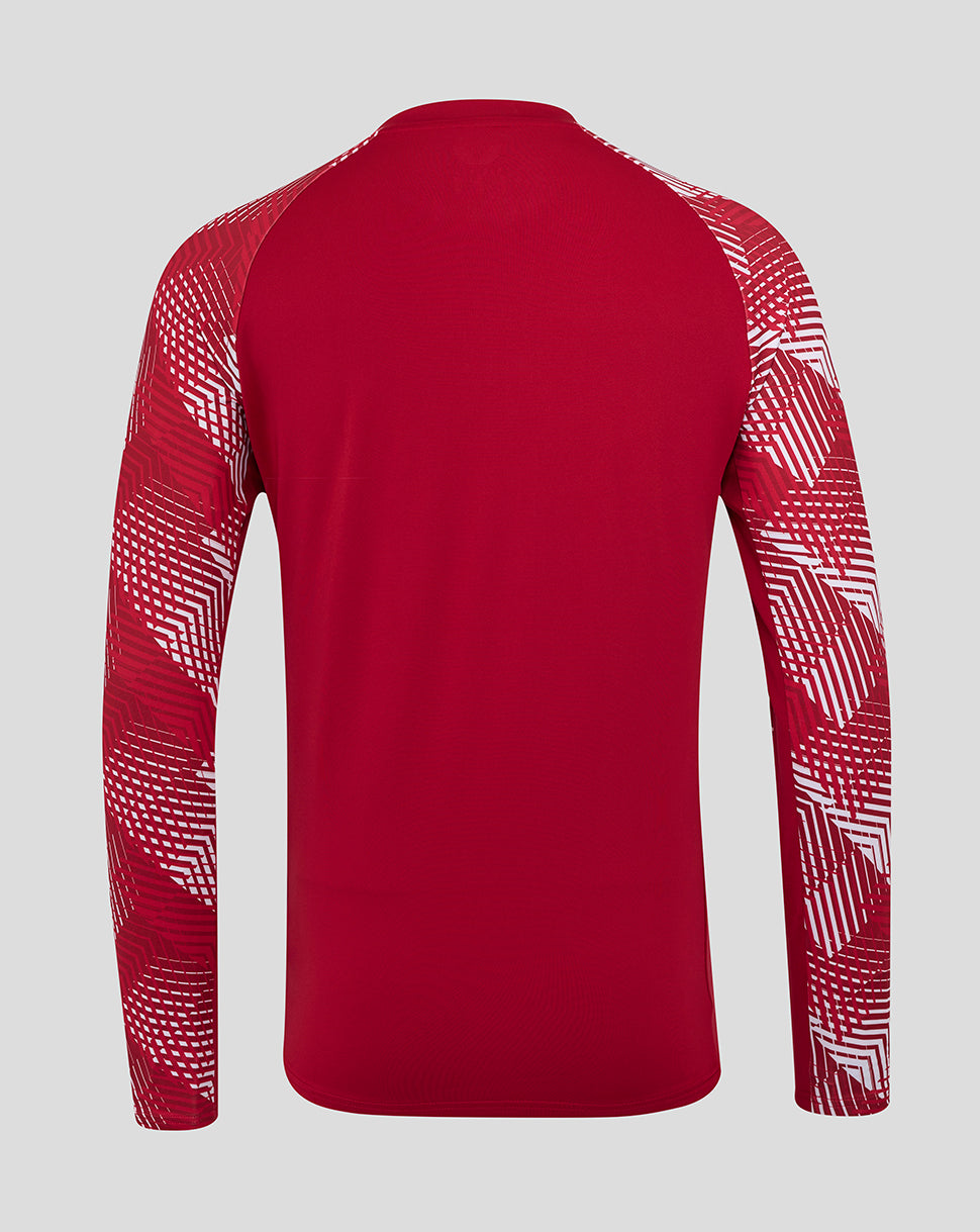 Back view of red England Rugby pre match long sleeve top with geometric white pattern on the sleeves