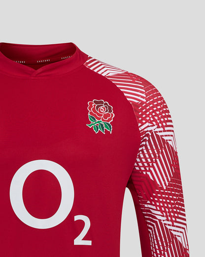 Front view of red England Rugby pre match long sleeve top with Rose crest on the left chest and large O2 logo center