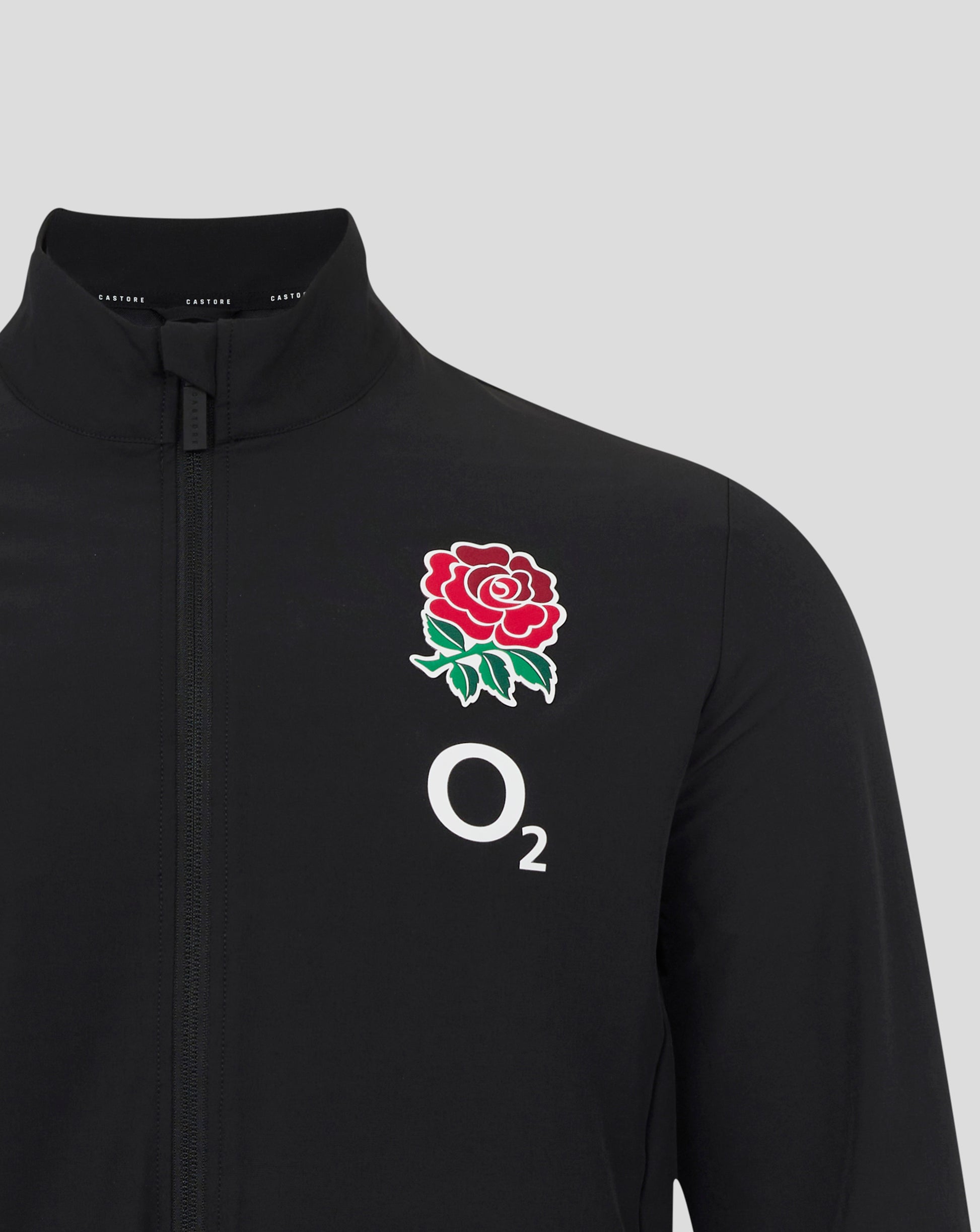 Close up of black England Rugby Alternate Anthem jacket with a red rose crest on the chest and front zipper