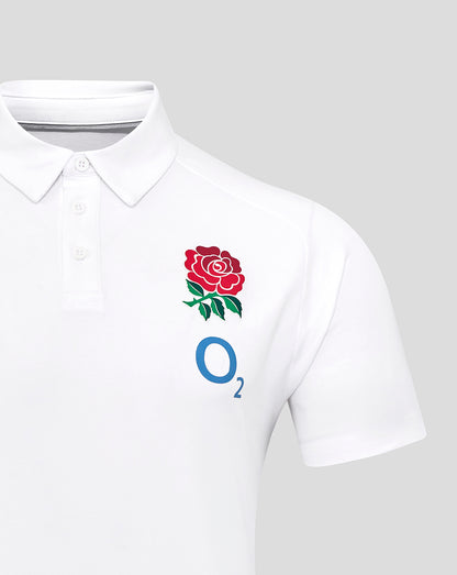 Brilliant white England Rugby travel polo with rose crest on left chest Castore branding on right chest and O2 logo below