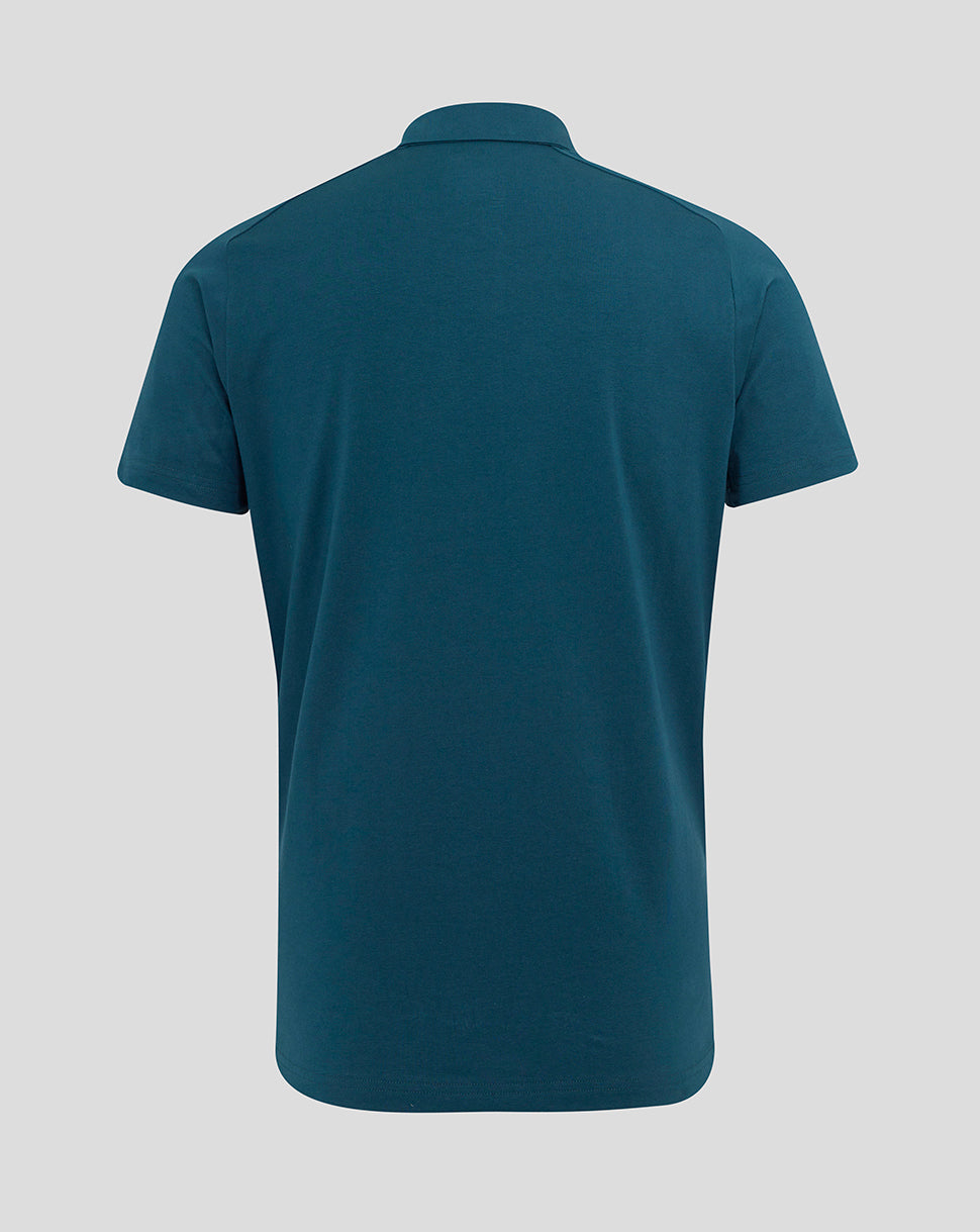 Back view of teal Reflecting Pond women’s England Rugby Travel Polo with collar and short sleeves.