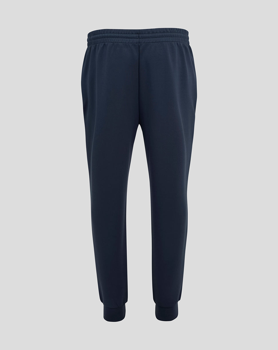 Front view of navy England Rugby Travel Knit Pant with drawcords ribbed cuffs and thigh logos.