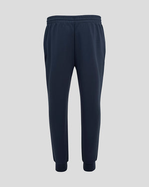 Front view of navy England Rugby Travel Knit Pant with drawcords ribbed cuffs and thigh logos.