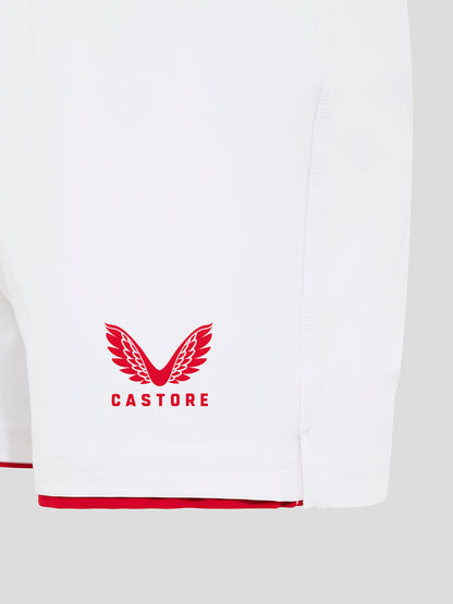 Side view of Brilliant White England Rugby Home Pro Shorts with blue O2 logo on the left thigh, red hem trim and Castore crest