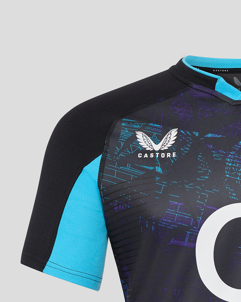 Shoulder close-up of the England rugby Pro shirt highlighting the graphic print and Castore branding on a black turquoise design