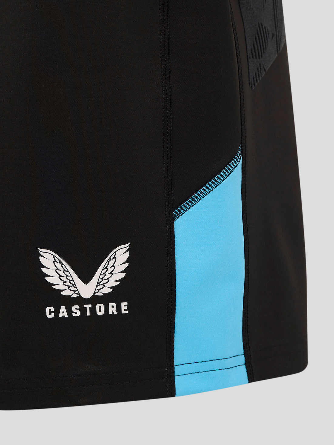 Back view close-up of black Pro Shorts with blue side panel and Castore logo on the left leg