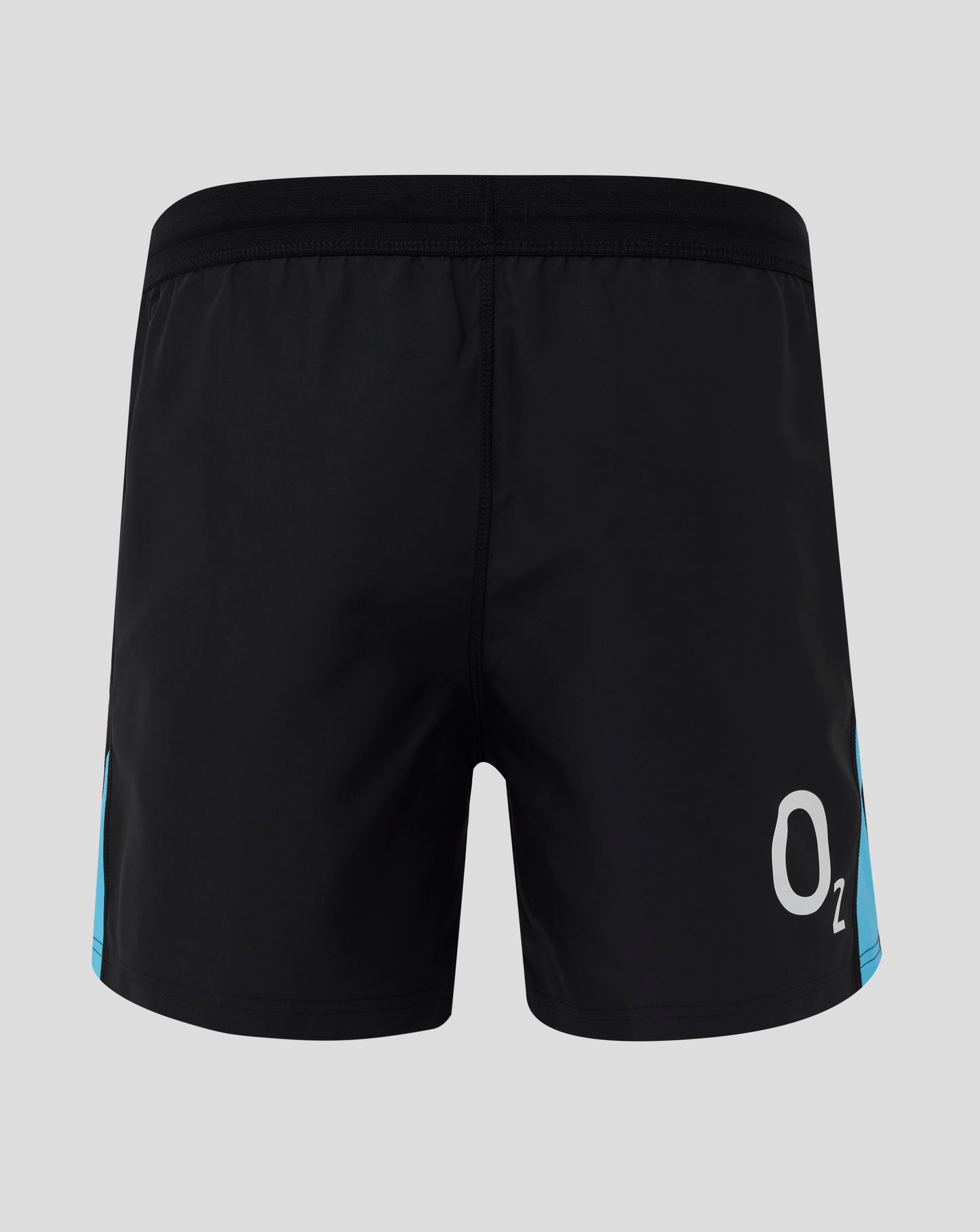 Back view of black England rugby shorts showing elastic waistband and a cyan side panel