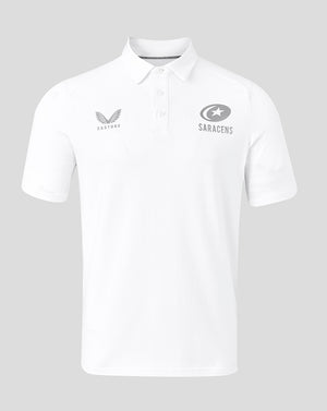 Front view of white Saracens travel polo with Castore logo on the left chest and Saracens emblem on the right.