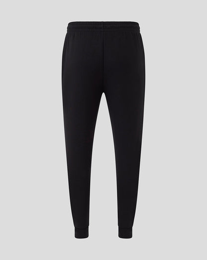 Black Saracens Travel Knit Pant side view with a prominent circular Saracens logo at the lower leg.